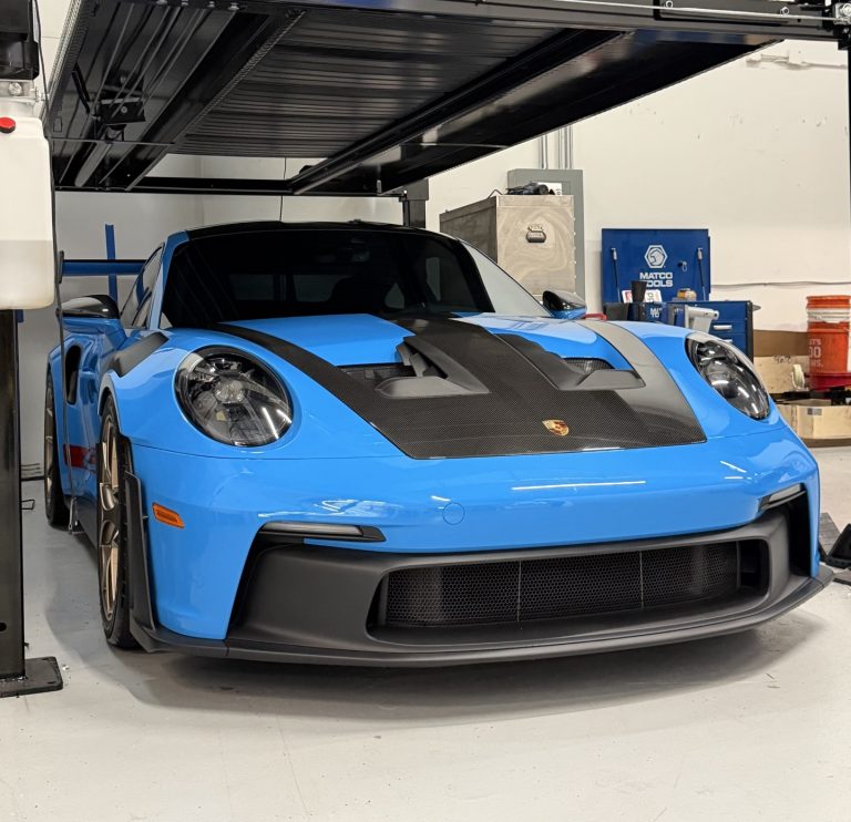 Blue porsche GT3 RS after paint correction and auto detailing services in Palm Harbor by First Class Detailing